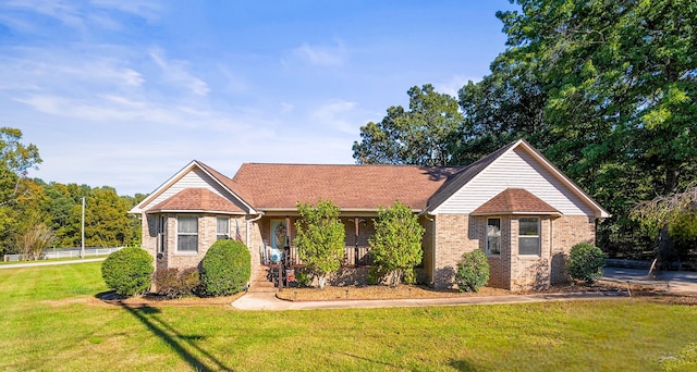 ranch-style home with a front yard