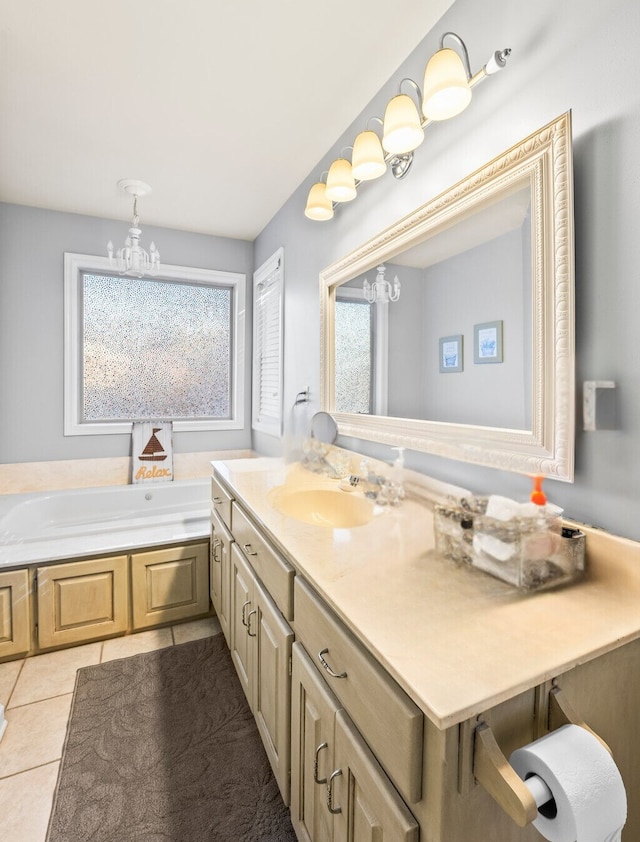 bathroom featuring vanity, a chandelier, and tile patterned flooring