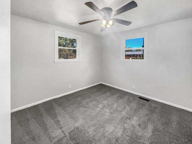 carpeted empty room with ceiling fan