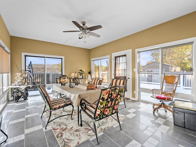 dining space with ceiling fan and a wealth of natural light