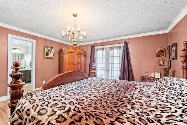 bedroom featuring a textured ceiling, ornamental molding, and light hardwood / wood-style flooring