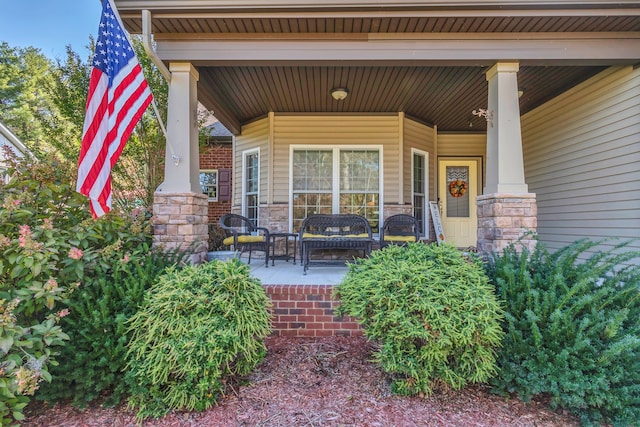 entrance to property with covered porch