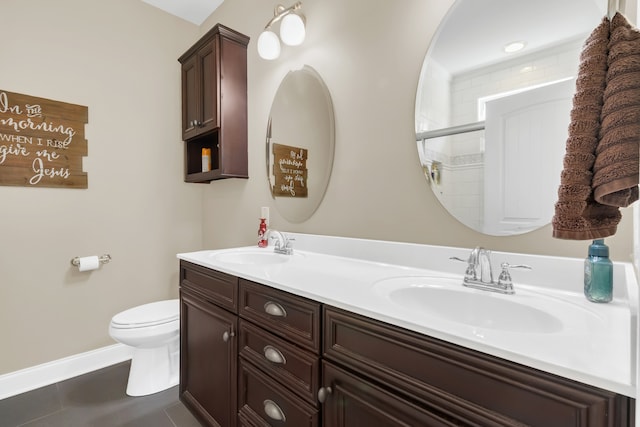 bathroom with walk in shower, vanity, toilet, and tile patterned flooring