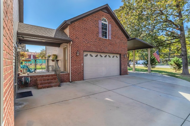 view of home's exterior with a garage