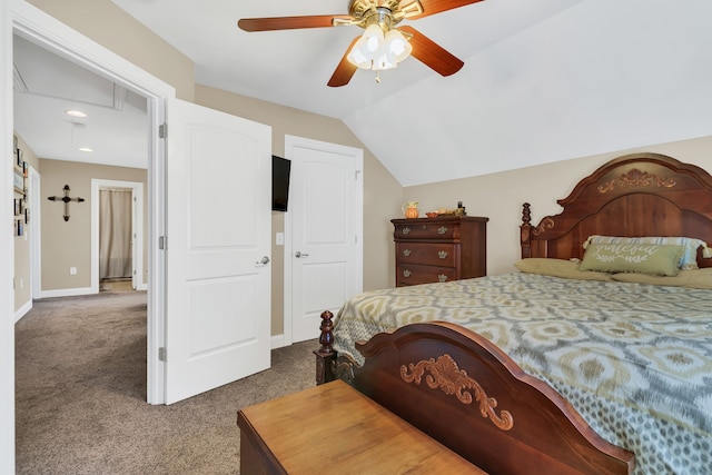 carpeted bedroom featuring vaulted ceiling and ceiling fan