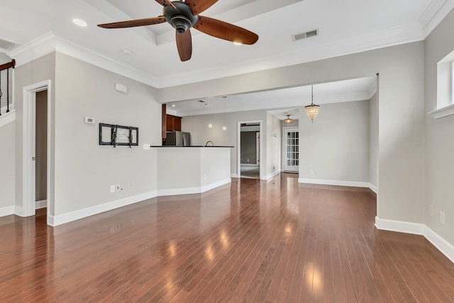 unfurnished living room featuring ornamental molding, dark wood-type flooring, and ceiling fan