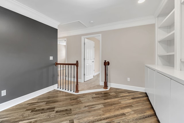 hallway featuring dark wood-type flooring and crown molding