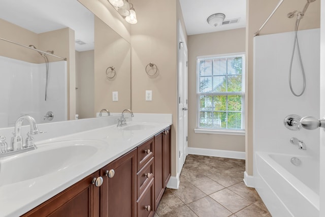 bathroom with vanity, tile patterned flooring, and tub / shower combination