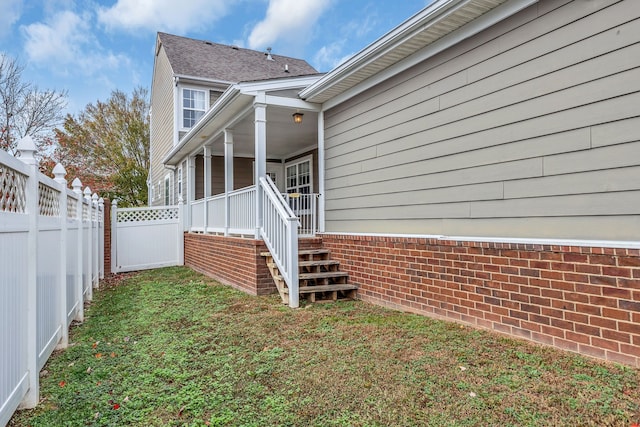 view of home's exterior with a yard