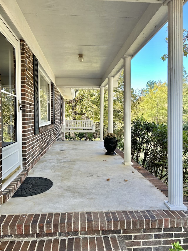 view of patio featuring a porch