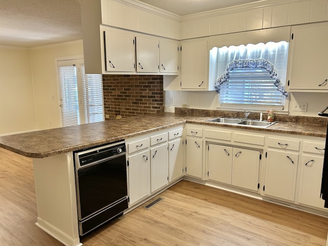 kitchen featuring black dishwasher, light hardwood / wood-style flooring, kitchen peninsula, and white cabinetry