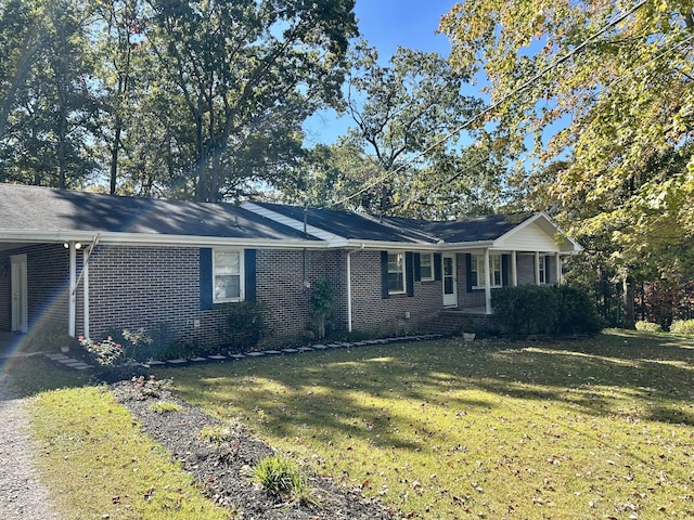 view of home's exterior with a lawn