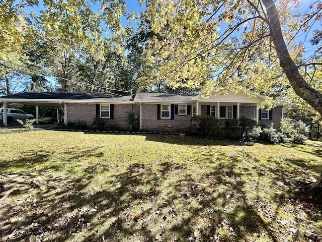 ranch-style home with a front lawn