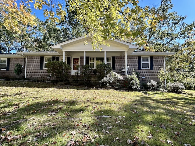 view of front of home with a front lawn