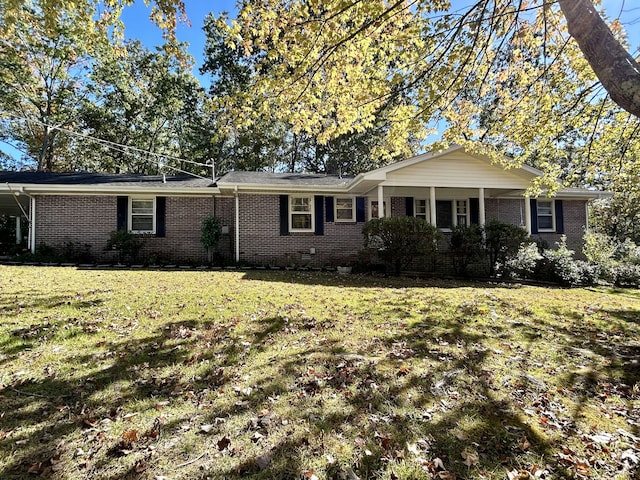 ranch-style house with a front yard