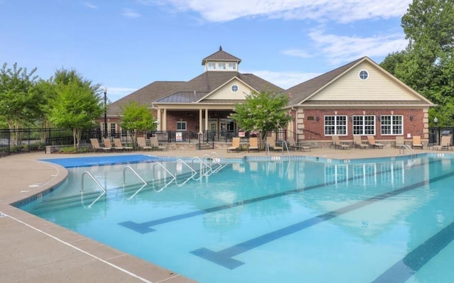 view of pool with a patio area