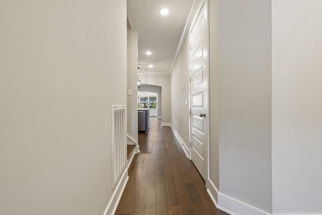 1509 Cedarbrooke Ln, Lebanon, TN 37090 - hallway with dark wood-style floors, crown molding, recessed lighting, and arched walkways