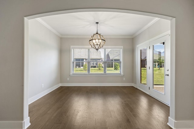 1509 Cedarbrooke Ln, Lebanon, TN 37090 - unfurnished dining area featuring dark wood-style flooring, crown molding, and a chandelier