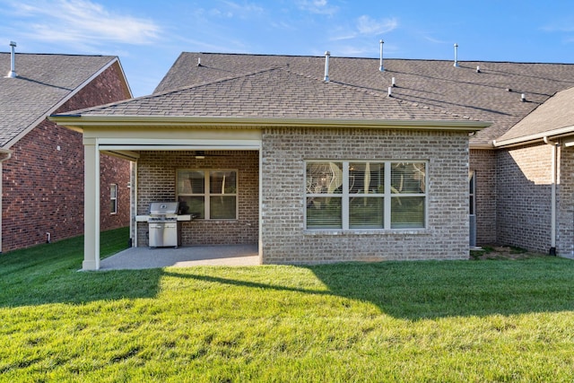 1509 Cedarbrooke Ln, Lebanon, TN 37090 - back of house featuring brick siding, a yard, and a patio