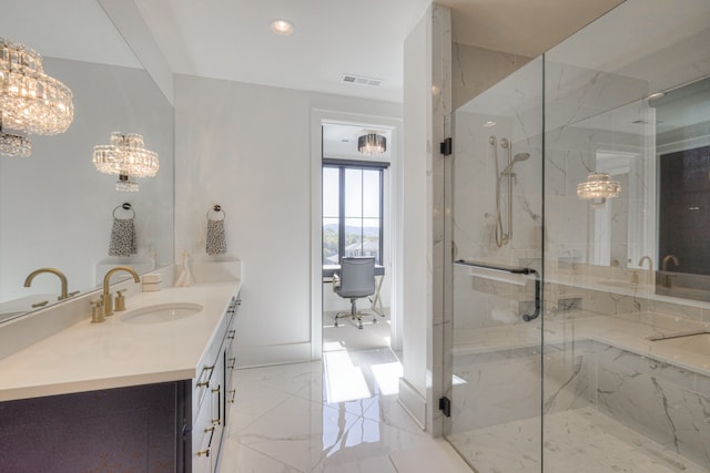 bathroom featuring vanity, shower with separate bathtub, and an inviting chandelier