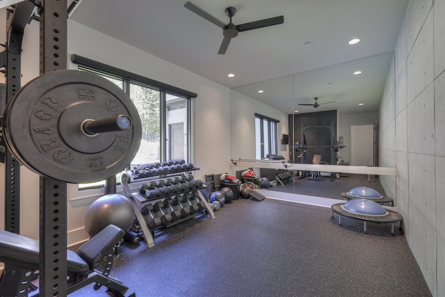 interior space with ceiling fan