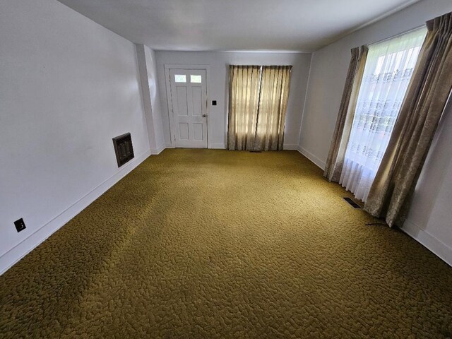 407 College Ave E, Carthage, TN 37030 - carpeted foyer with baseboards