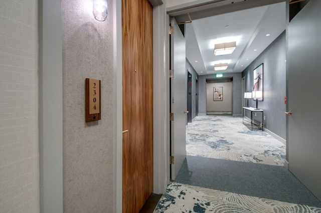 corridor featuring carpet floors