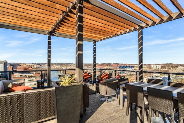 view of patio with outdoor lounge area, a water view, and a pergola