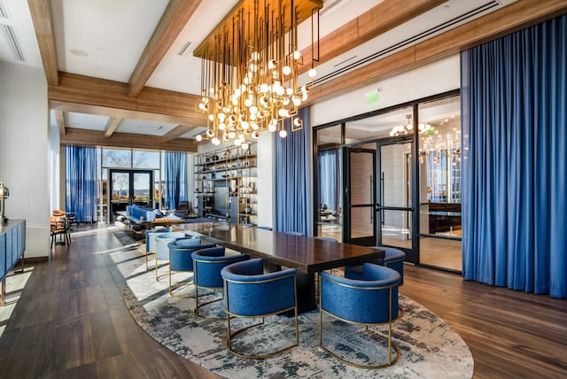 dining room with beamed ceiling, a chandelier, dark hardwood / wood-style floors, and indoor bar