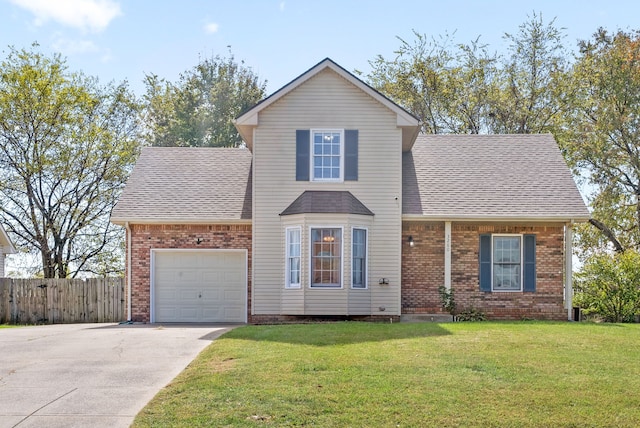 front facade with a front lawn and a garage