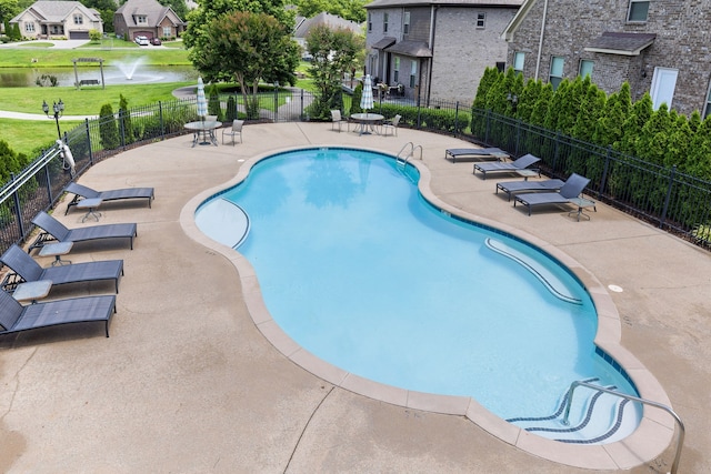 view of pool featuring a patio area