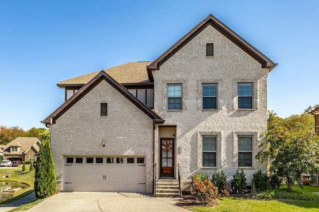 view of front of property featuring a garage