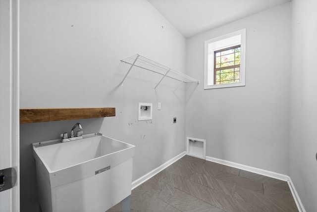 washroom featuring sink, hookup for a washing machine, and electric dryer hookup