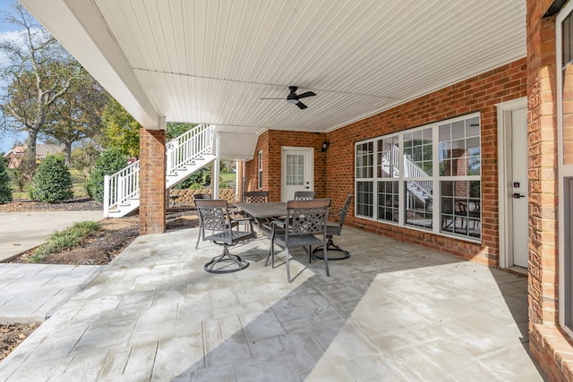 view of patio featuring ceiling fan