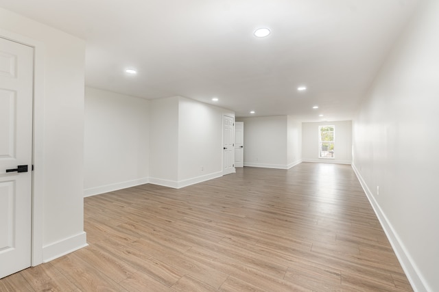 empty room with light hardwood / wood-style floors