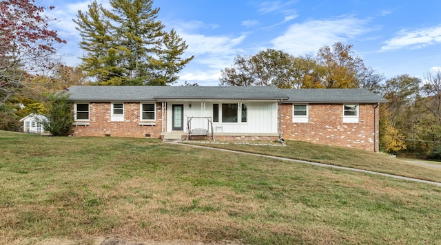 ranch-style house with a front lawn