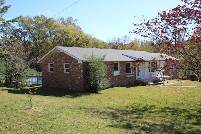 exterior space with a front lawn