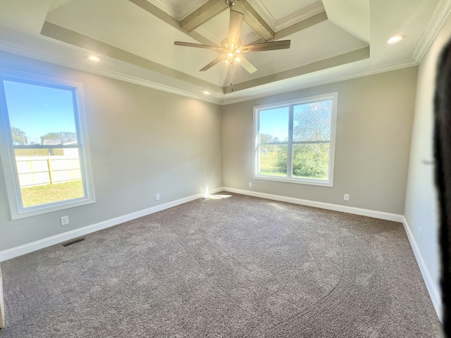 spare room featuring coffered ceiling, ceiling fan, a tray ceiling, ornamental molding, and carpet flooring