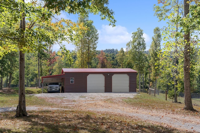 garage featuring a carport