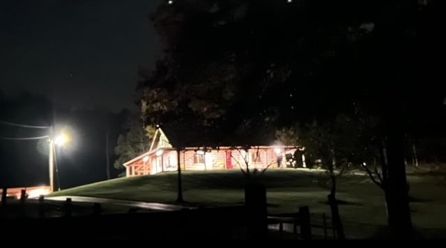 view of yard at night