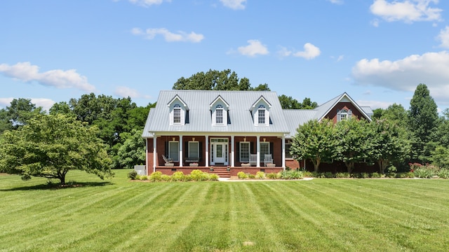 view of front facade featuring a front yard and a porch