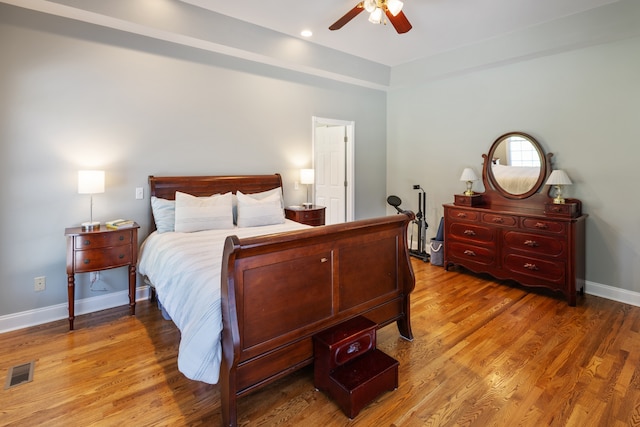 bedroom featuring ceiling fan and wood-type flooring