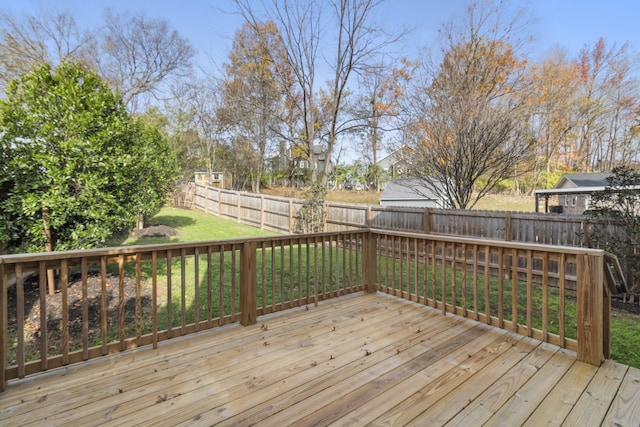 wooden deck with a yard