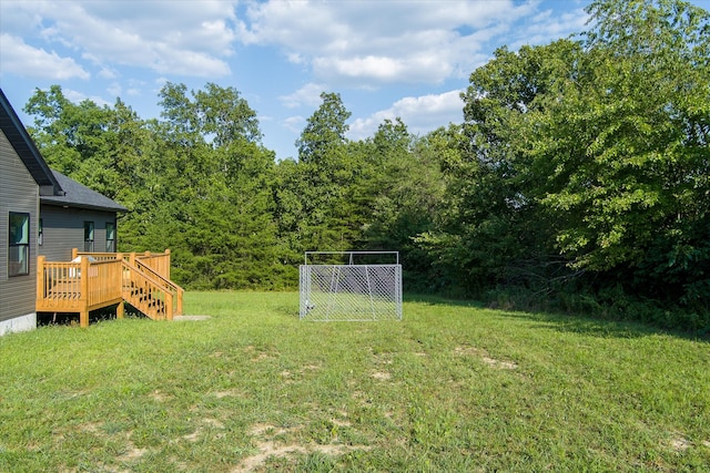 view of yard featuring a deck