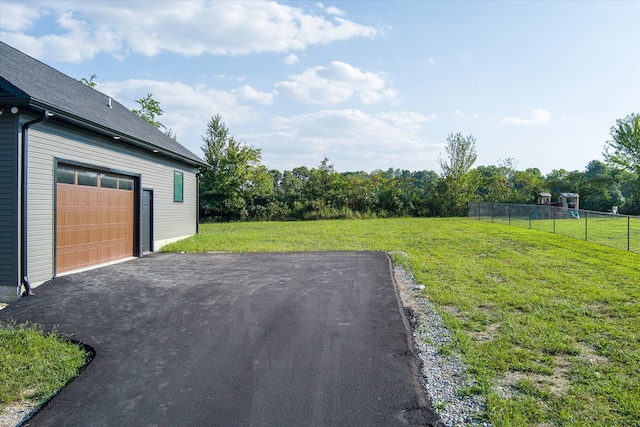 view of yard with a garage