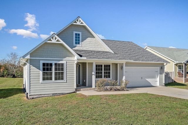 view of front facade featuring a front yard and a garage