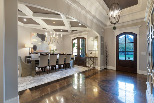 entrance foyer featuring crown molding, french doors, coffered ceiling, beam ceiling, and a chandelier