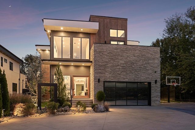 modern home featuring a garage