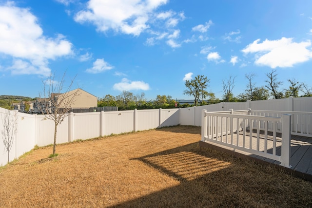 view of yard featuring a deck