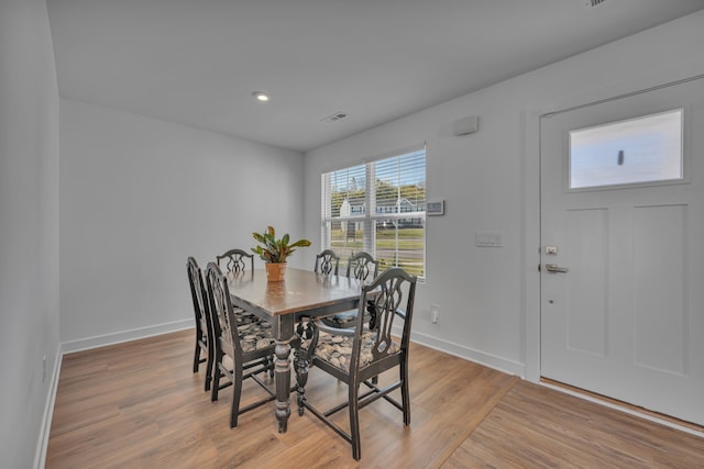 dining room featuring light hardwood / wood-style floors